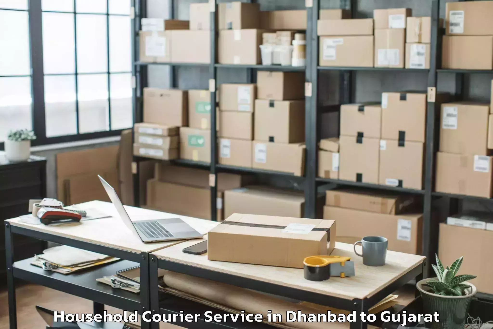 Easy Dhanbad to Koyali Household Courier Booking